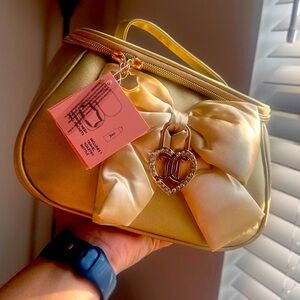 NWT Juicy Couture Gold Satin Bow Makeup Bag w/ Rhinestone Heart Charm